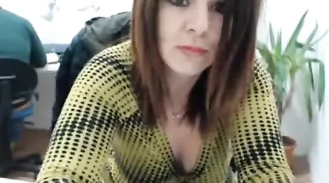 Mature secretary masturbates on webcam next to her boss
