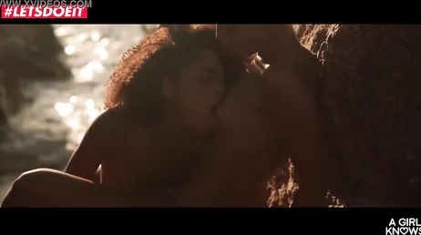 Lesbian friends enjoy a very hot sunny day at the beach