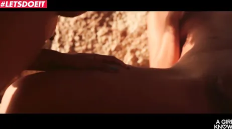 Lesbian friends enjoy a very hot sunny day at the beach