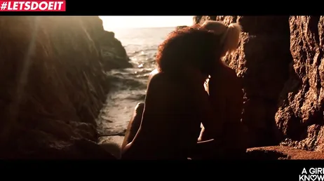 Lesbian friends enjoy a very hot sunny day at the beach