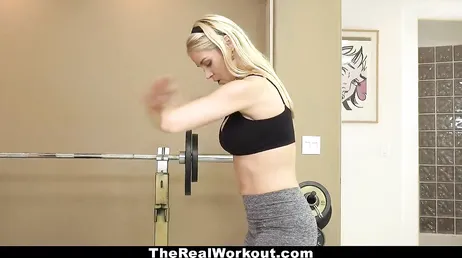 He puts his hands on the ass of the gym trainer.