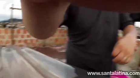 Latina slut goes up to the roof to do laundry and fucks the neighbor