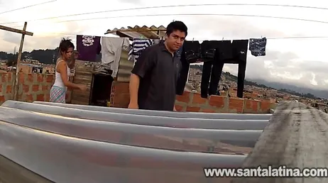 Latina slut goes up to the roof to do laundry and fucks the neighbor