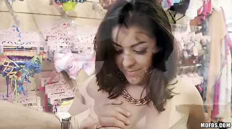 The customer stands naked in front of the clerk