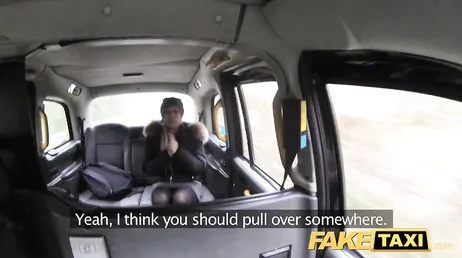 The veteran taxi driver puts his head between the client's legs