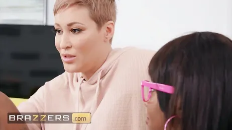 Black Daizy Cooper in a lesbian fuck with Ryan Keely