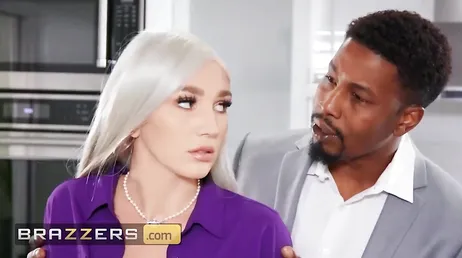 The black boss has very long hands with the secretary.