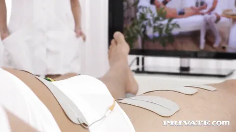 The two nurses look with desire at this patient's cock.