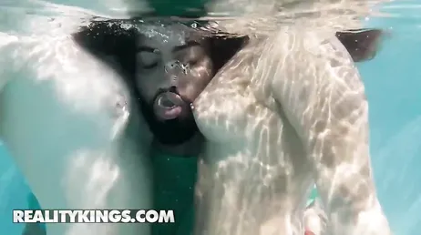 The food delivery guy catches the two of them eating each other's pussies.