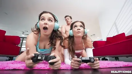 They play video games while their roommate fucks them